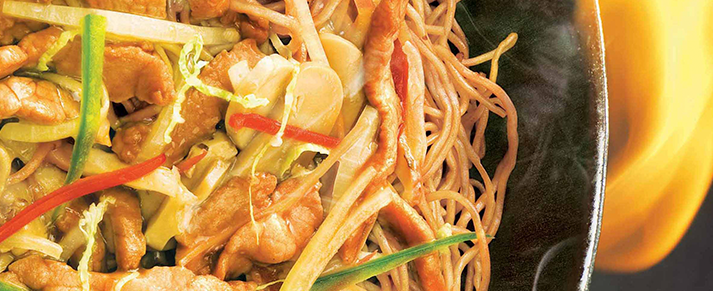 Plate of foodservice Amoy Asian Chow Mein Noodles in a restaurant setting