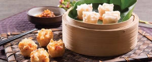 Basket of foodservice Amoy Asian Shrimp Shaomai in a restaurant setting