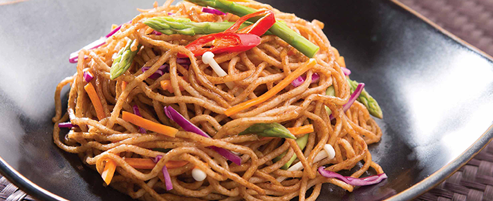 Bowl of foodservice Amoy Asian Whole Wheat Noodles in a restaurant setting